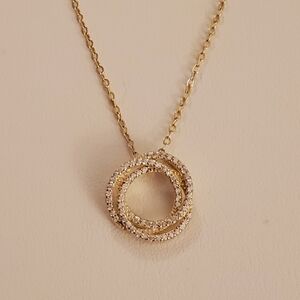 Elegant Gold and Silver Intertwined Necklace